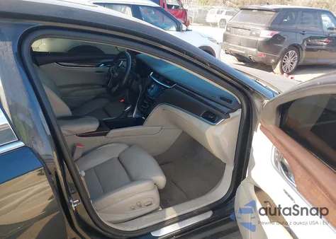 2014 Cadillac Xts Luxury from USA, damaged, VIN 2G61M5S32E9210628